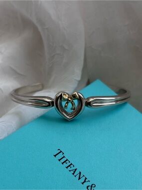 Tiffany & Co. Silver Cuff Bracelet with Gold Bow Heart Accent